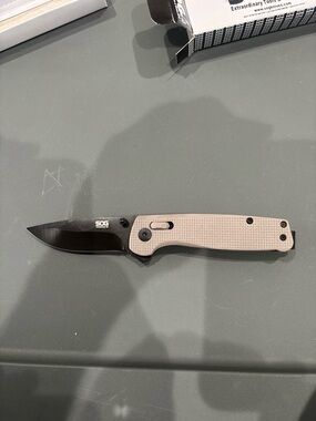 SOG Folding Pocket Knife - Tan Handle, Black Blade